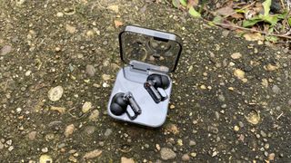 the nothing ear 1 wireless earbuds in their charging case
