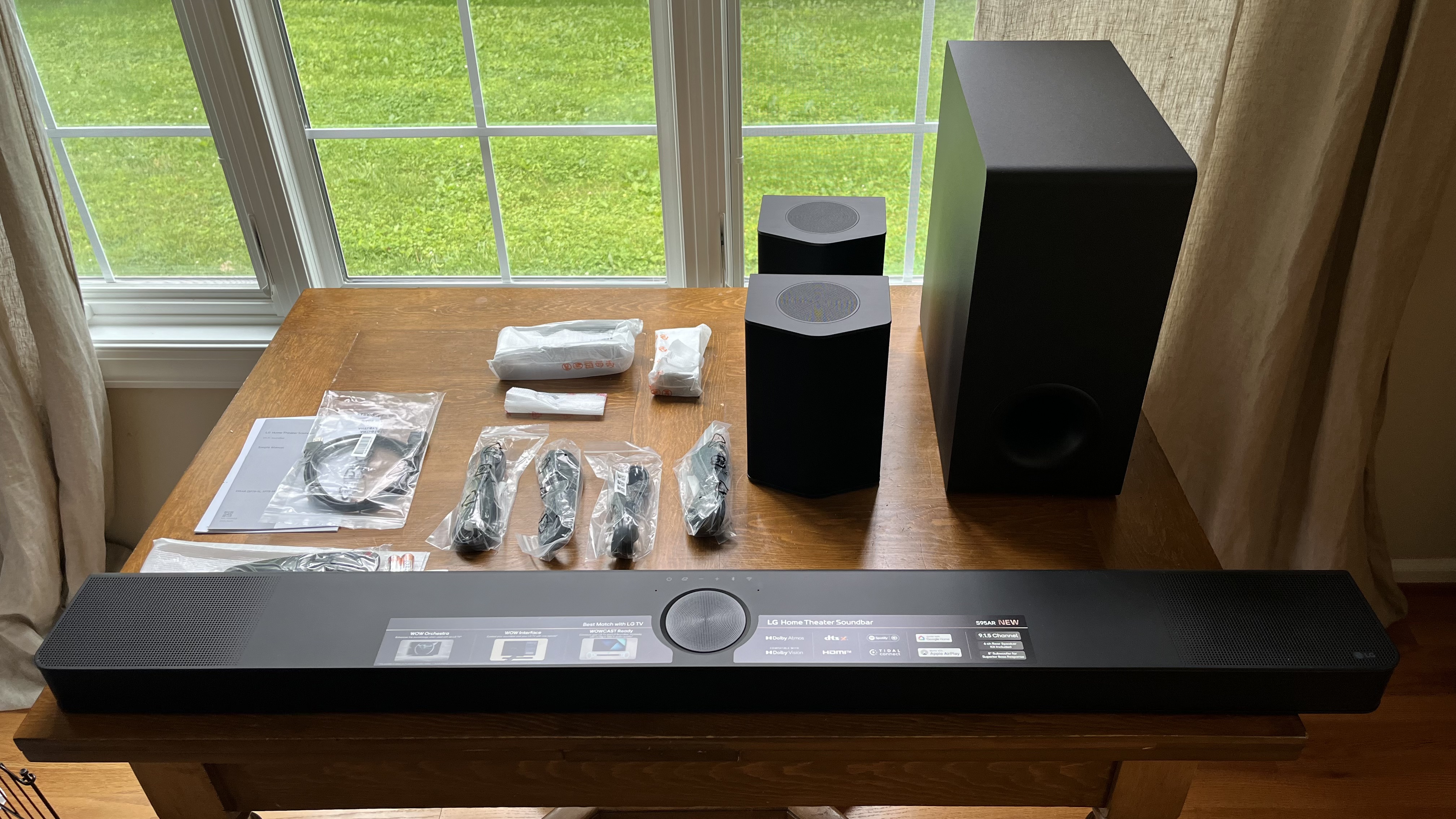 LG S95AR on table with accessories