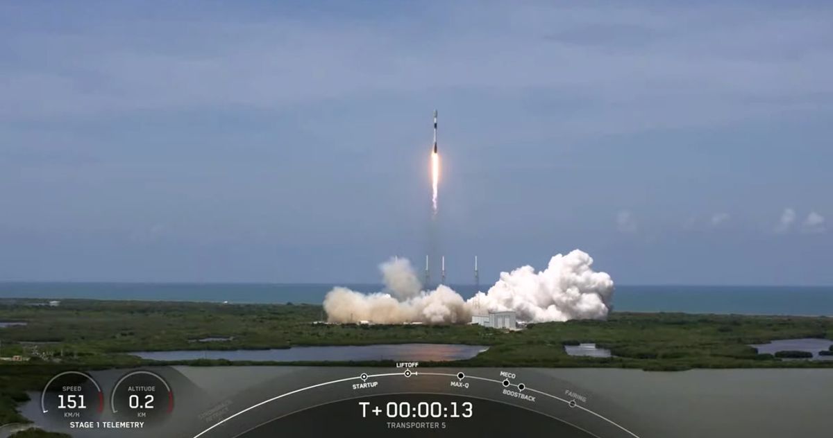 A SpaceX Falcon 9 rocket launching the Transporter 5 mission in May 2022.