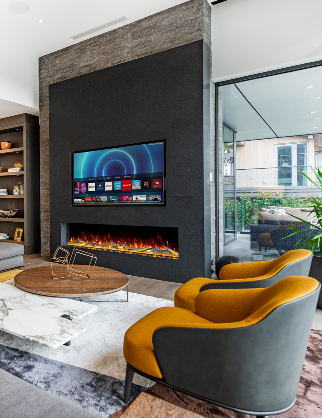 Design tricks for a TV above a fireplace to enhance decor | Livingetc