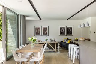 modern open plan kitchen diner with recessed downlights