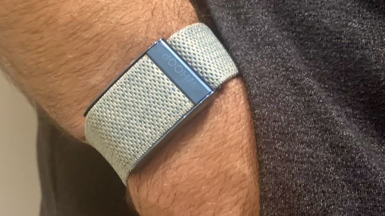Man wearing Whoop 4.0 health and fitness wearable tracker