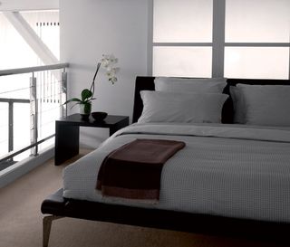 'Dandy' bedlinen by Hugo Boss, with furniture by Roche Bobois and Maxalto