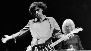 Chris Stein and Debbie Harry perform with Blondie in 1980