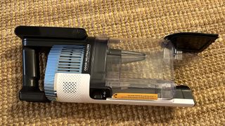 Shark Cordless Pro vacuum with dust bin release open