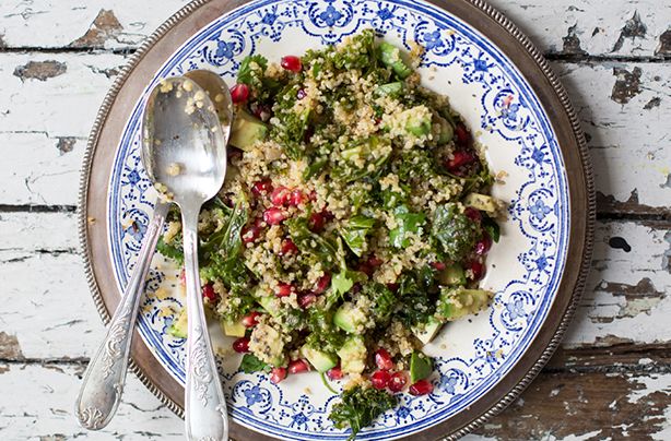 Warm kale, avocado, pomegranate and quinoa salad