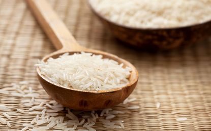 Rice in a bowl on a neutral background