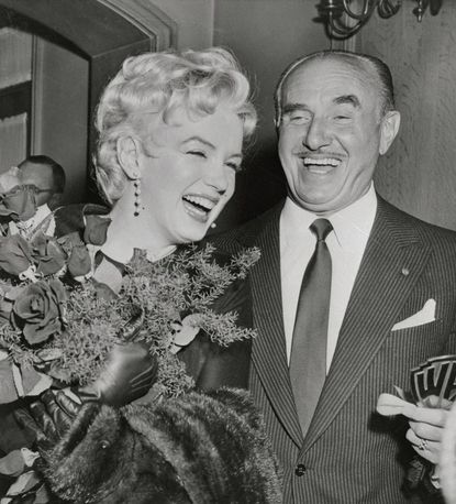 1956: Being congratulated by the studio head