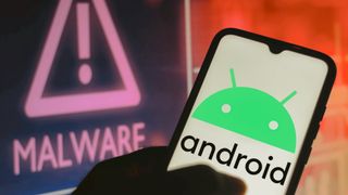 Android logo on phone next to Malware sign