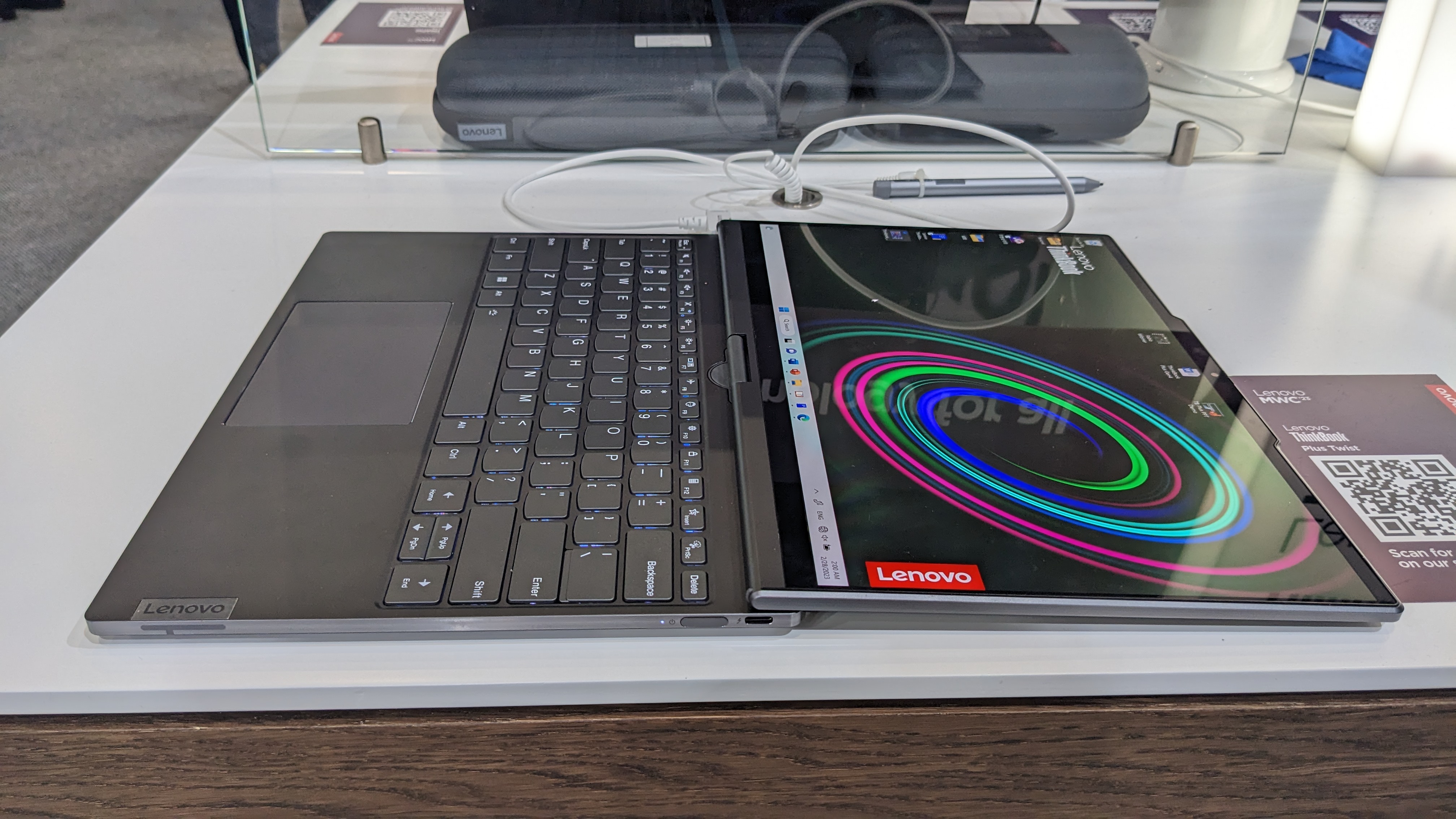 The Lenovo ThinkBook Plus Twist laptop on a display stand at the MWC 2023 event.