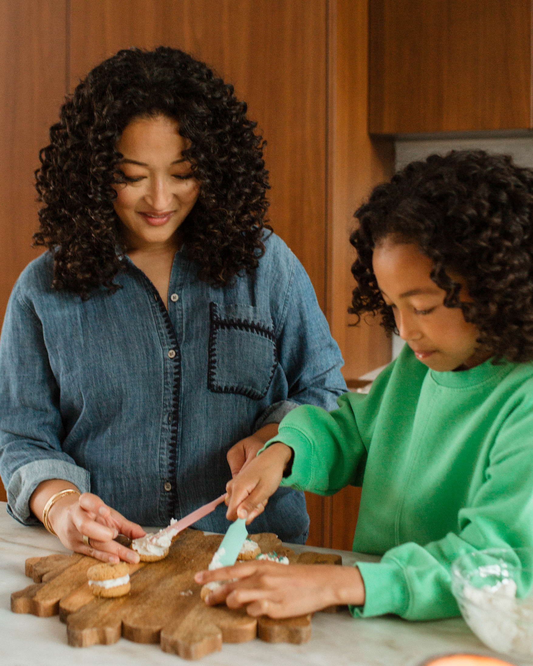 Denise Woodard making cookies with her daughter.