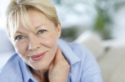 Blonde senior woman relaxing at home