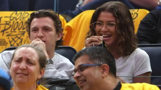 Tom Holland and Zendaya watch the Los Angeles Lakers take on the Golden State Warriors during Game 2 of the playoffs.