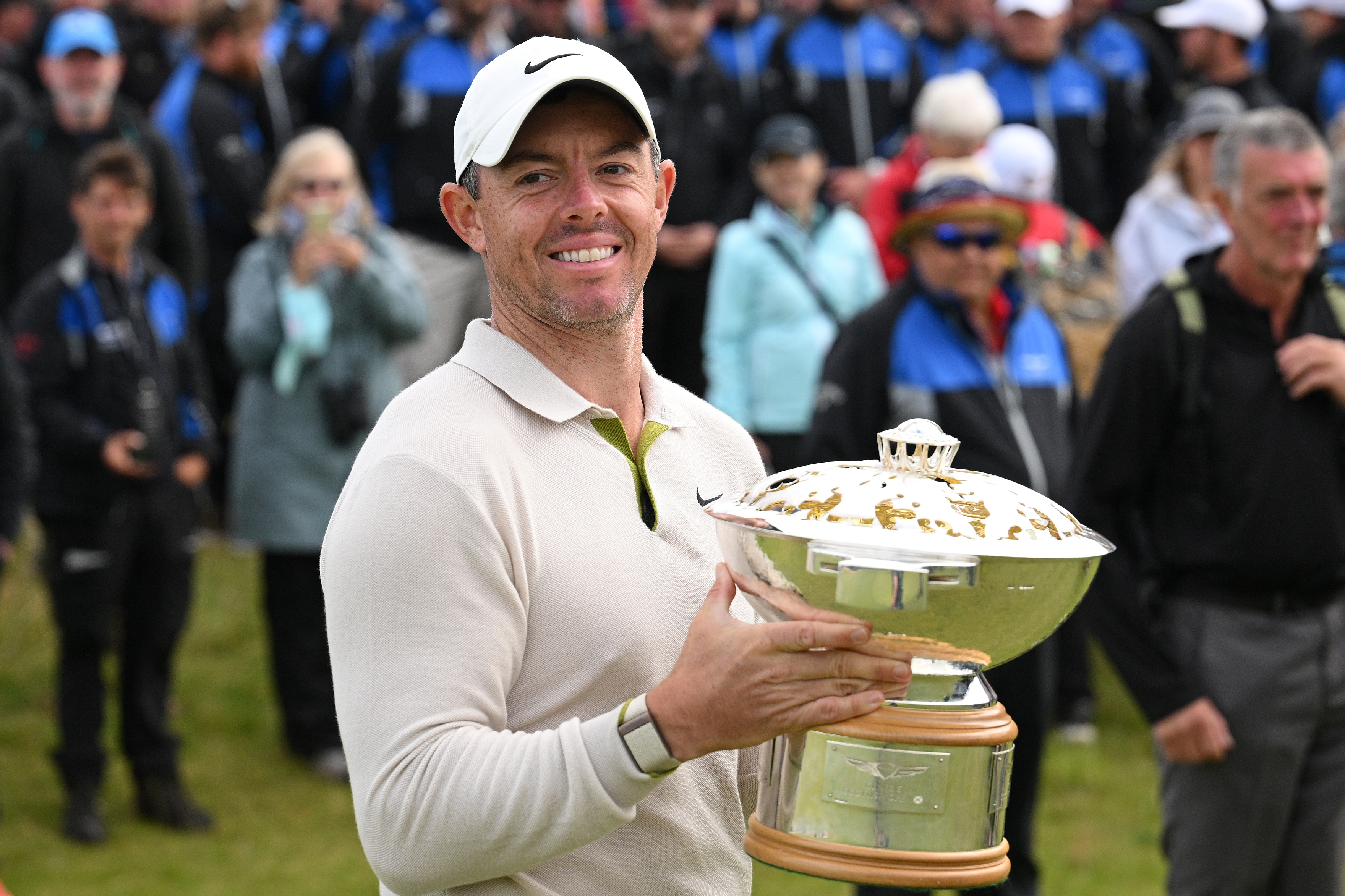 Rory McIlroy holds the Genesis Scottish Open trophy in 2023