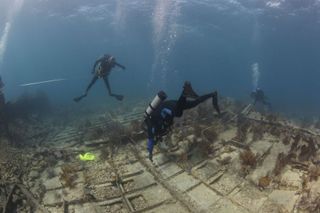 NOAA divers surveying and taking measurements above the wreck of the Hannah M. Bell in September, 2012, off the coast of Key Largo, Fla.