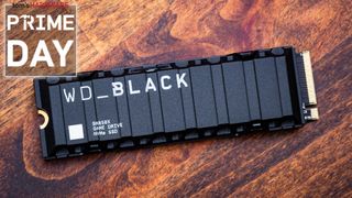 The WD Black SN850X SSD with heatsink on a wooden table