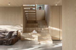 Timber clad interior of villa timmerman, a Swedish home