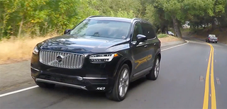 The XC90's electronically assisted steering handled mountain roads with precision.