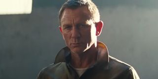 No Time To Die Daniel Craig looking upset in the sunlight