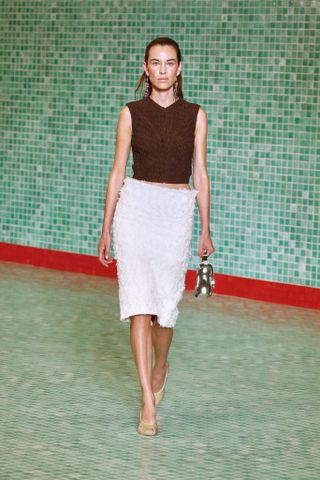 Alexa Chung walks the runway at the Tory Burch show