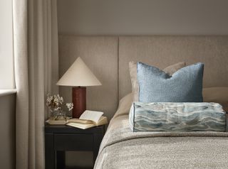 minimalist bedroom with modern bedside lamp