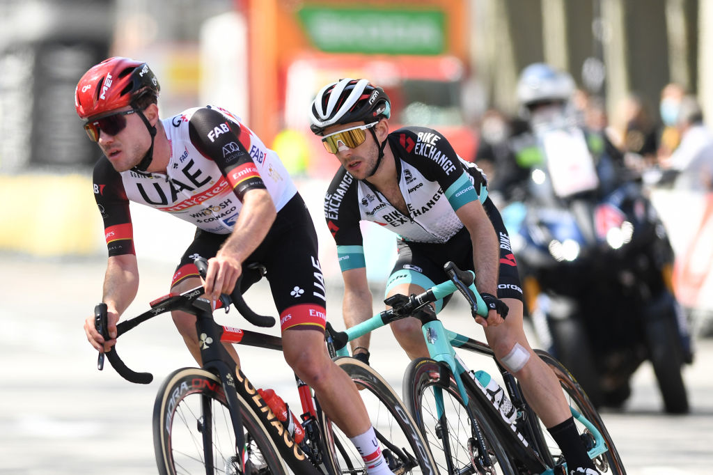 BARCELONA SPAIN  MARCH 28 Marc Hirschi of Switzerland and UAE Team Emirates  Simon Yates of United Kingdom and Team BikeExchange during the 100th Volta Ciclista a Catalunya 2021 Stage 7 a 133km stage from Barcelona to Barcelona  VoltaCatalunya100  on March 28 2021 in Barcelona Spain Photo by David RamosGetty Images