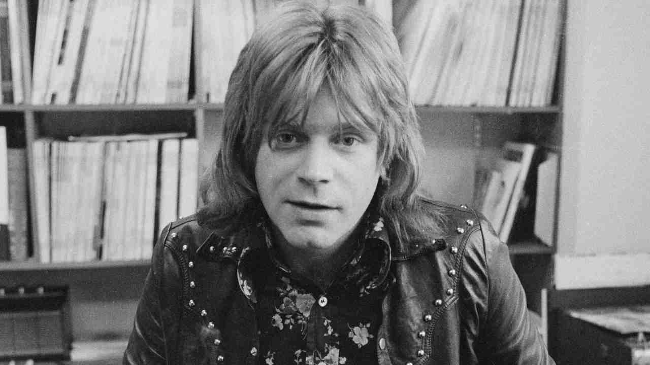 Dave Edmunds posing for a photograph in the 1970s