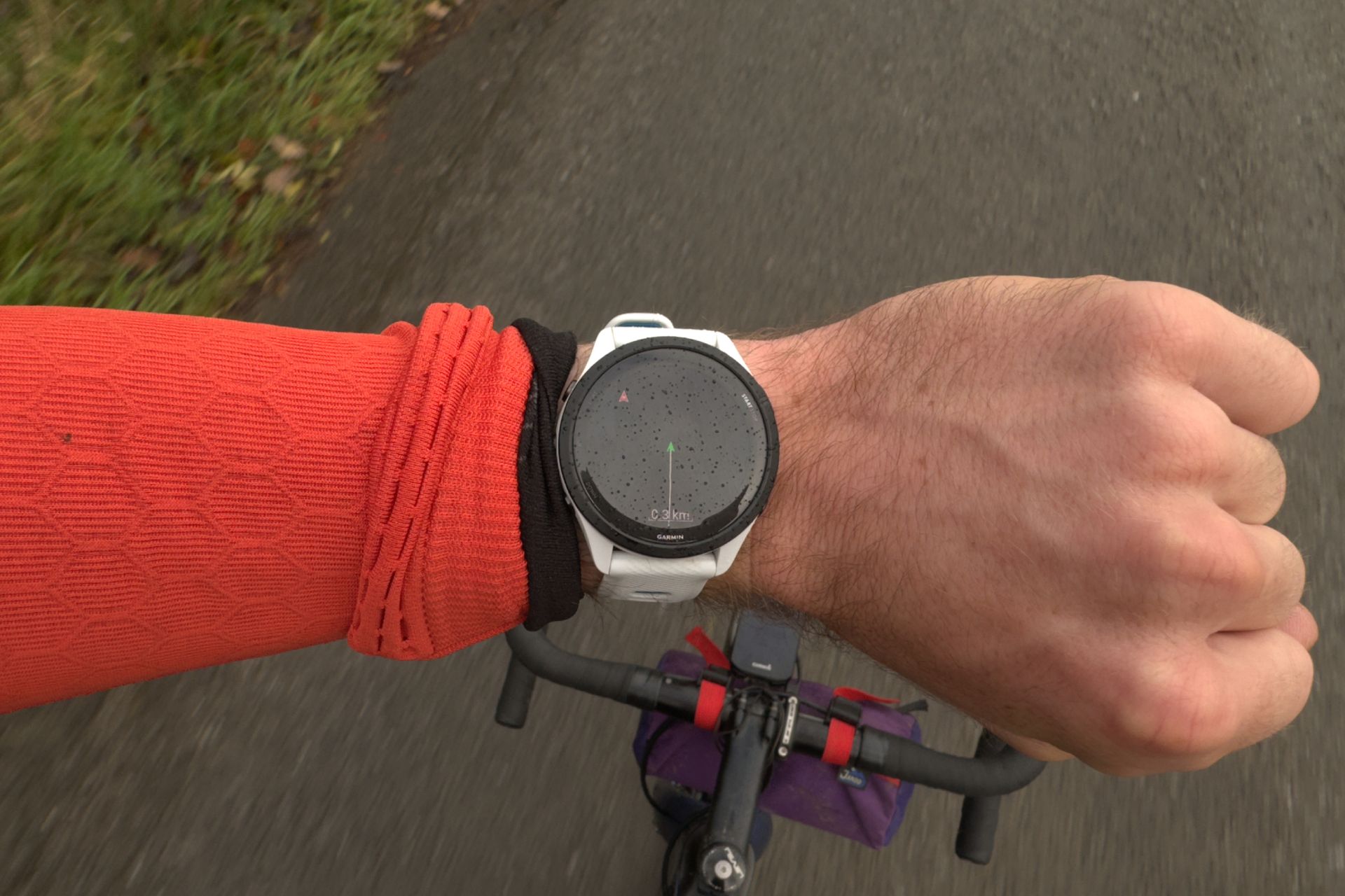 Male cyclist wearing the Garmin Forerunner 265