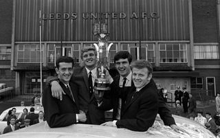 Leeds team-mates (left to right) Terry Hibbitt, Gary Sprake, Peter Lorimer and Billy Bremner with the Inter-Cities Fairs Cup following a 1-0 aggregate victory over Ferencvaros in the 1968 final