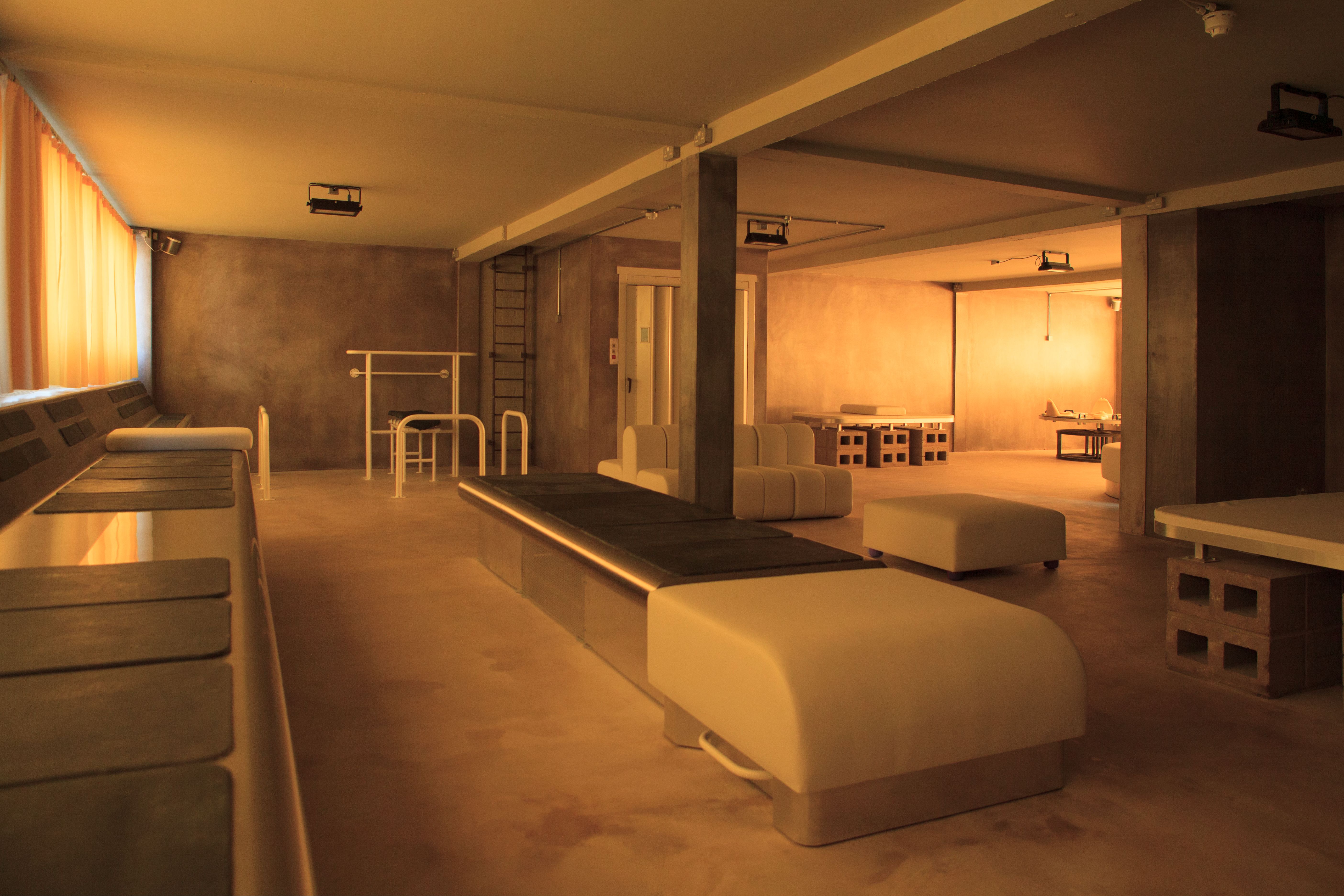 view of a new space in Dalston for intimacy, work and community, where concrete structures sit alongside rubber-cast seating