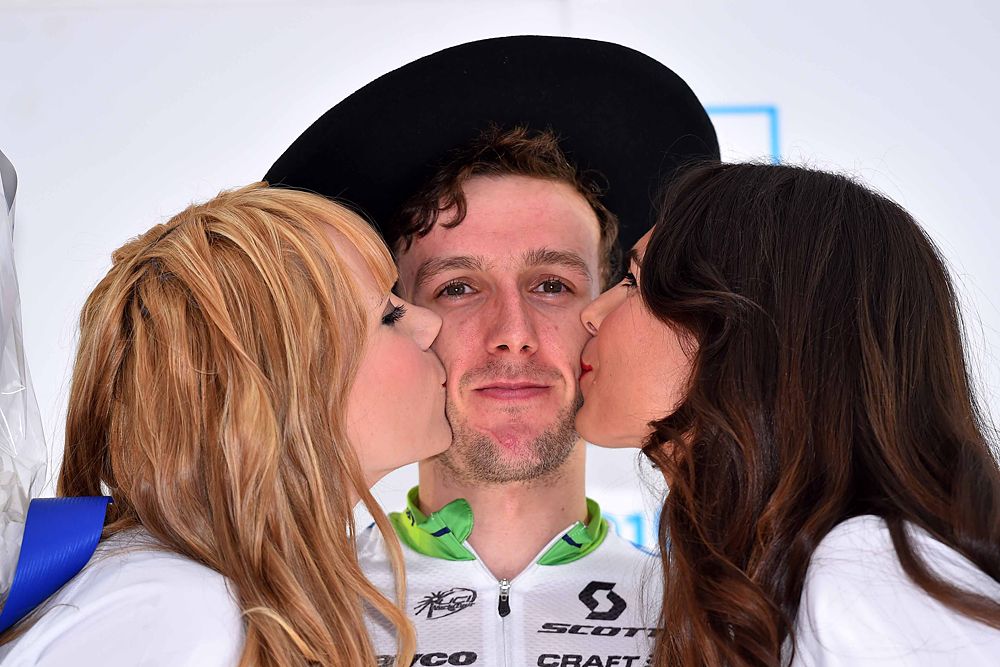 Podium kisses for Clasica San Sebastian winner Adam Yates (Orica-GreenEdge)