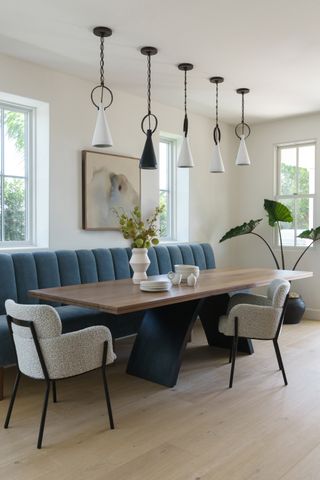 The dining room with blue banquette seating