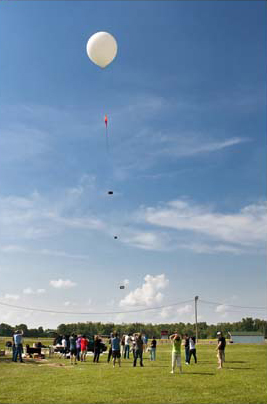 A NASA balloon carries student-designed experiments during the first Balloonsat High-Altitude Flight competition in 2010. 