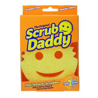 Scrub Daddy yellow sponge in orange cardboard packaging