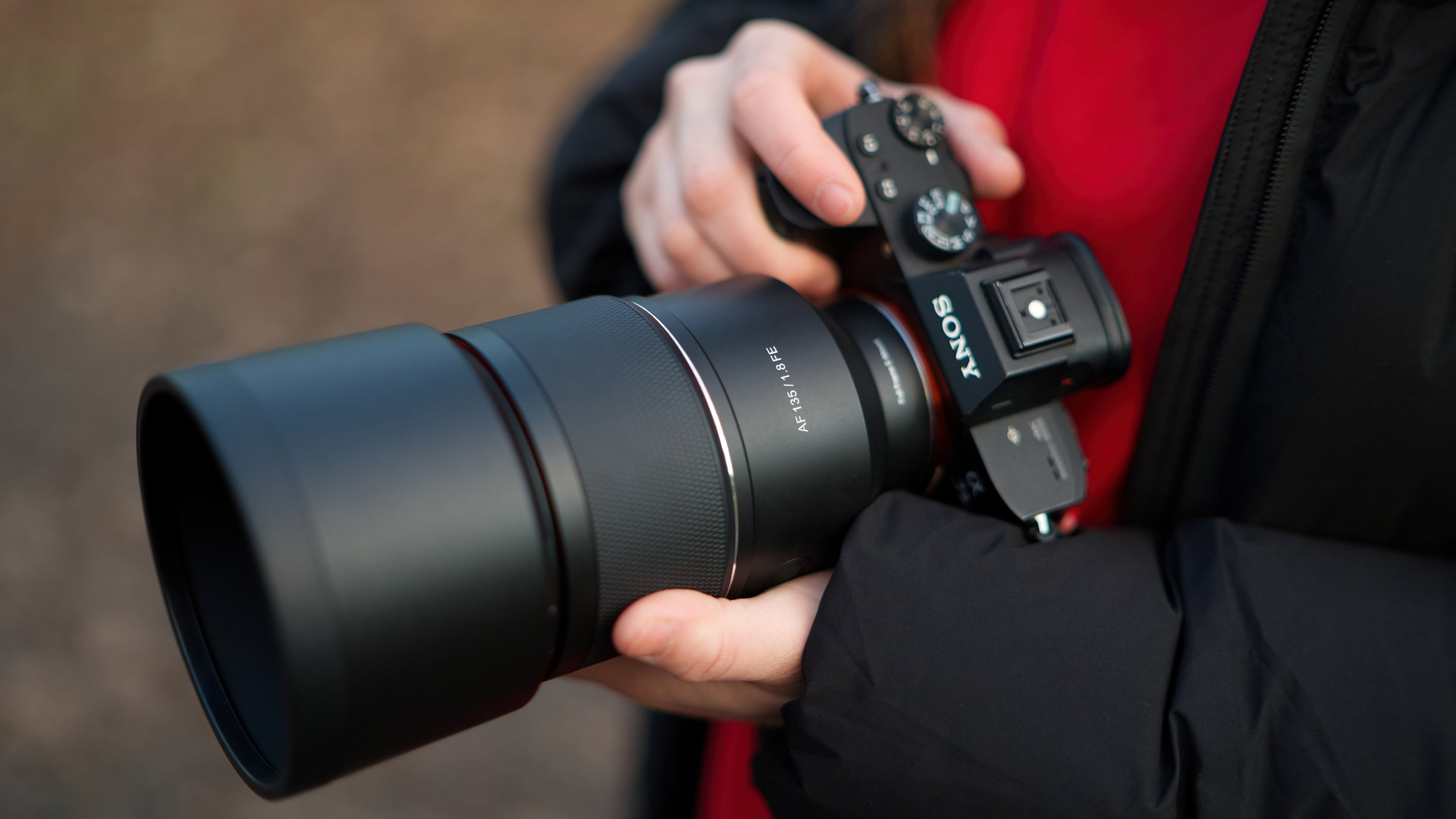 The Samyang AF 135mm F1.8 FE lens mounted on a Sony camera