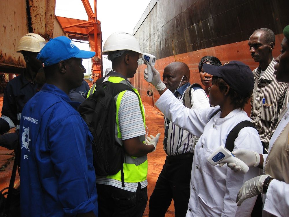 Ebola temperature check in Guinea