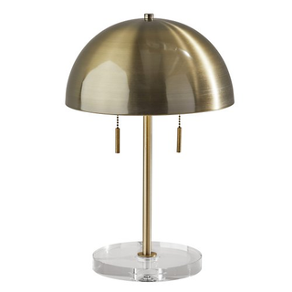 Brass table lamp with clear ceramic bottom