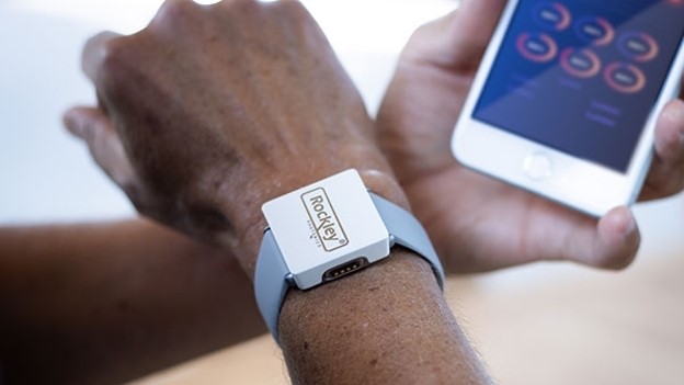 Rockley Photonics 'wearable lab' device on a man's wrist