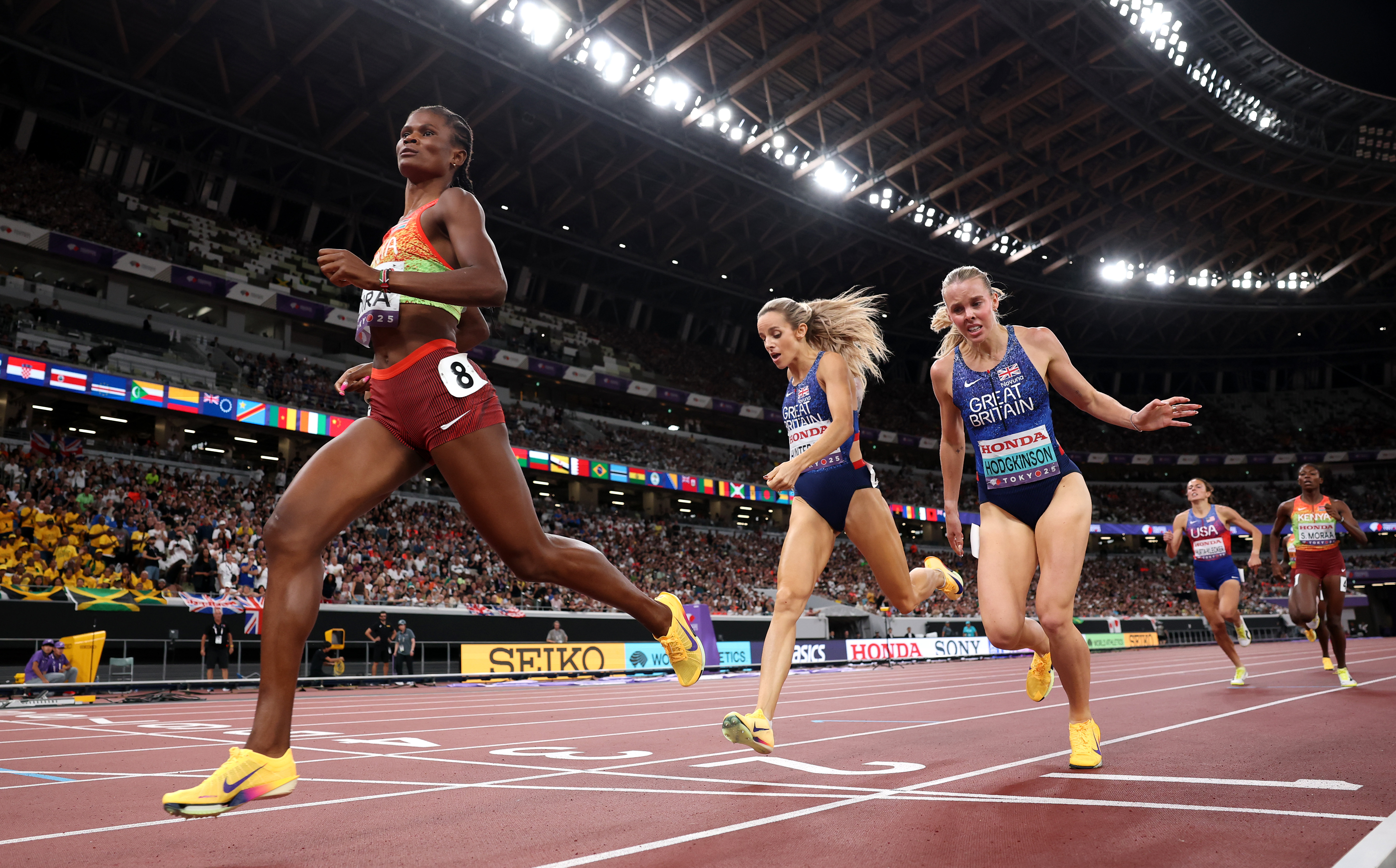 Lilian Odira of Team Kenya (L) crosses the finish line to win the gold medal followed by silver medalist Georgia Hunter Bell of Team Great Britain (C) and bronze medalist Keely Hodgkinson of Team Great Britain (R) during the Women&#039;s 800 Metres Final on day nine of the World Athletics Championships Tokyo 2025