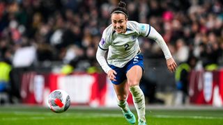 Lucy Bronze chases after the ball for the England Lionesses