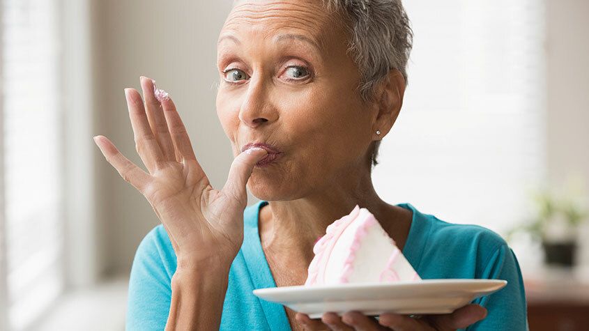 Woman eating cake