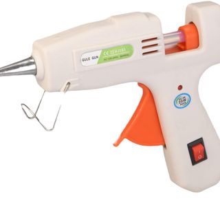 cream and orange glue gun