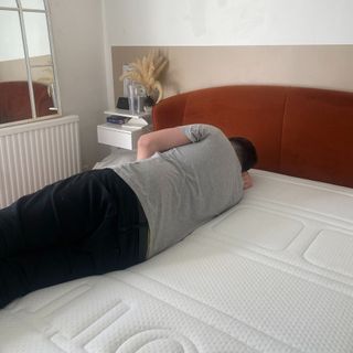 Otty Pure Plus mattress with man laying on mattress