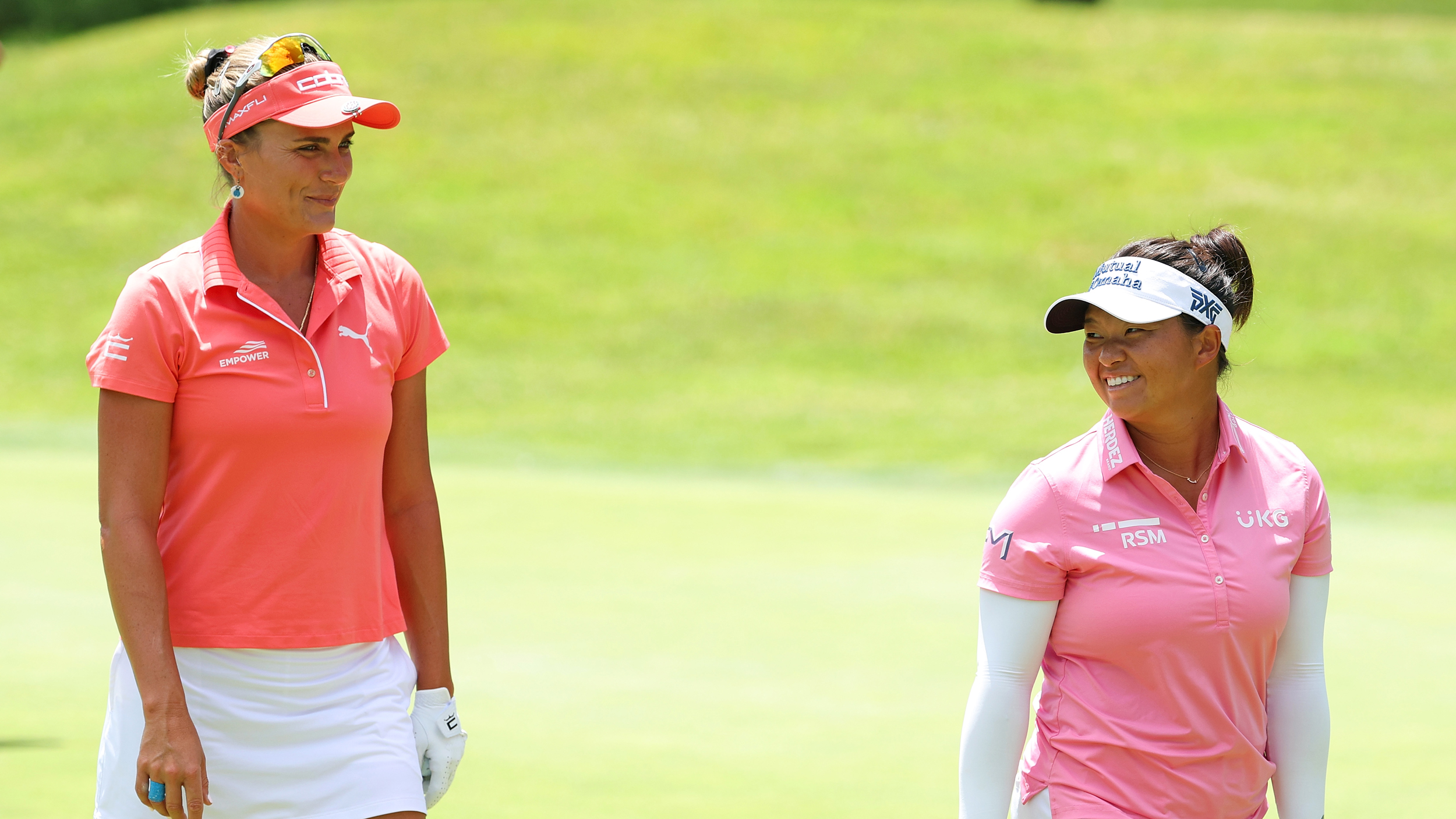 Lexi Thompson (left) and Megan Khang smile during the 2025 Dow Championship