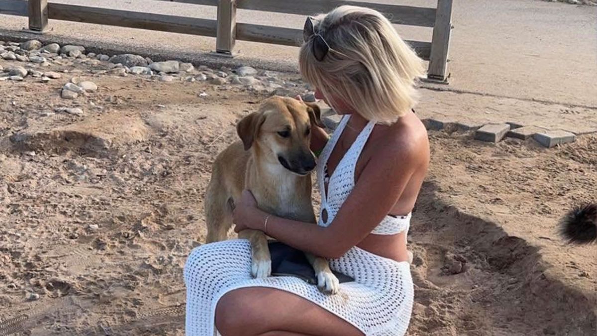 Saffron Dixon with street dog in Morocco