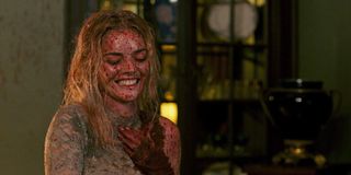 Samara Weaving laughing and covered in blood in Ready or Not