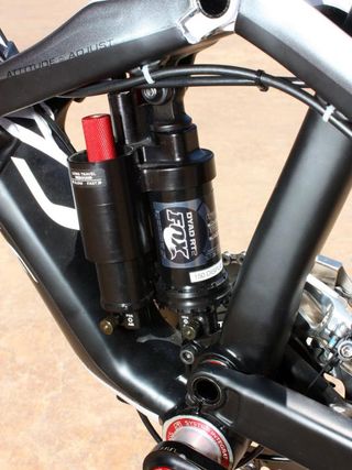 The Fox Racing Shox Dyad-RT2 rear shock is essentially two shocks tied together with a central chamber that selects between the two.