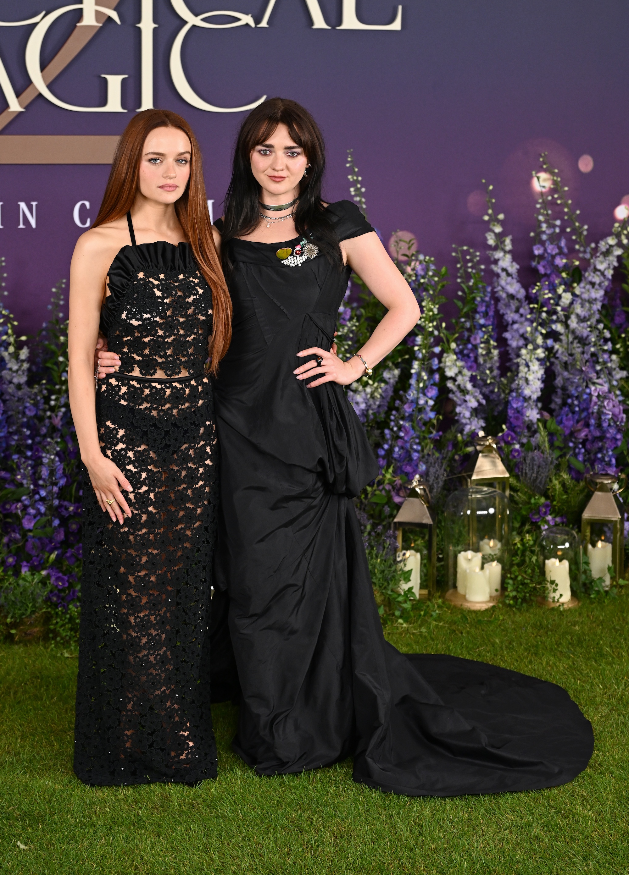 Maisie Williams and Joey King posting at the Practical Magic 2 London premiere.