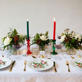 Traditional retro style Christmas centrepiece with red and green candles