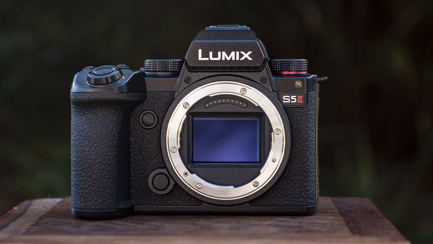 Panasonic Lumix S5 II camera on a table with view of the front and lens removed revealing full frame sensor
